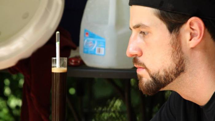 Chad measuring the gravity of his home brew
