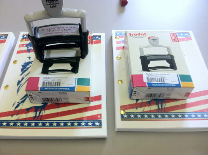 Step 5. To accompany the bound formal reply, we also inclosed a Trodart Model 5208 professional grade self-inking rubber stamp with red ink and the saying "If a law isn't public, it isn't a law. Justice Stephen Breyer."