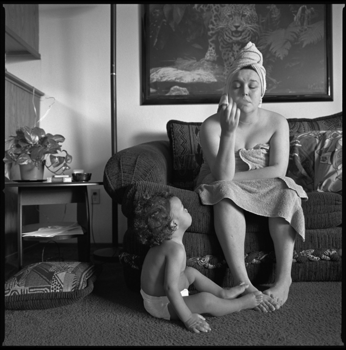 Tiny at thirty, on the couch, smoking with Ray Shon, Seattle, 1999