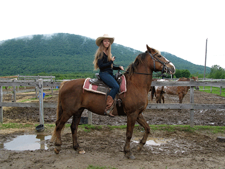 Nora Caron riding