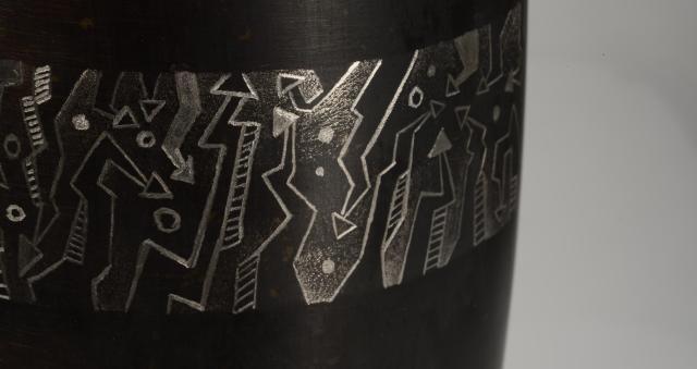 engraving trial on a black oxide coated mug