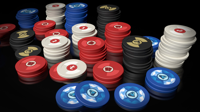 Clay poker chips in the deluxe version of Pandante.