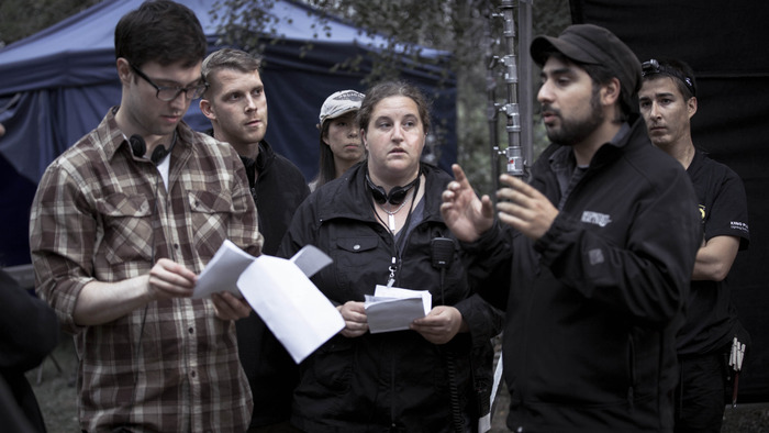 (left to right) director Braden Croft, producers Adrian Salpeter & Liz Levine, hair/makeup artist Joyce Tu, gaffer Corey Jacques, cinematographer Naim Sutherland discuss an upcoming set up on Day 2 of production