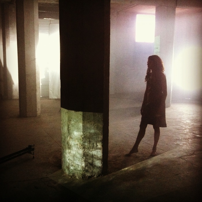 A dancer in the warehouse during shooting.