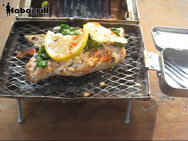 Grilled chicken breast, garnished with lemon, paprika and parsley, cooked on the Hobogrill HG2-Deluxe prototype