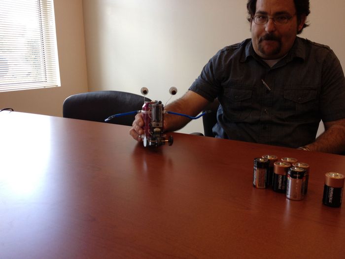 Butch shows off his first robot.