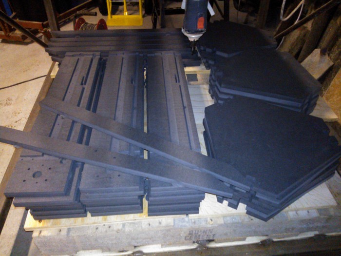 First batch of black valchromat panel sets, as supplied by our CNC partners. Per default, we will treat the panels with hard wax oil or a 2 pack varnish, depending on production volumes. The resulting finish resembles slate.