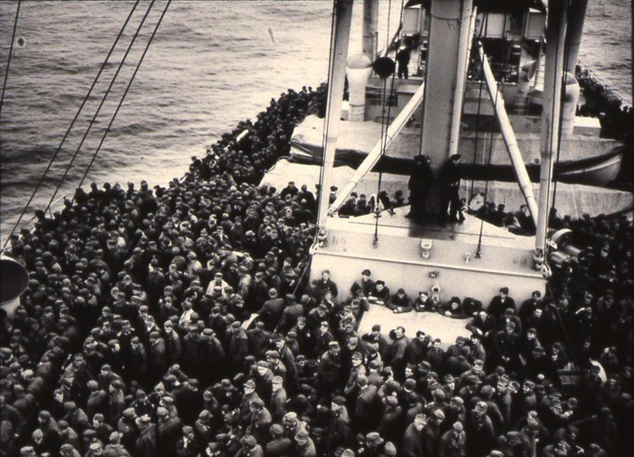 Thousands of German POWs are transported on an American ship to prison camps in the United States.