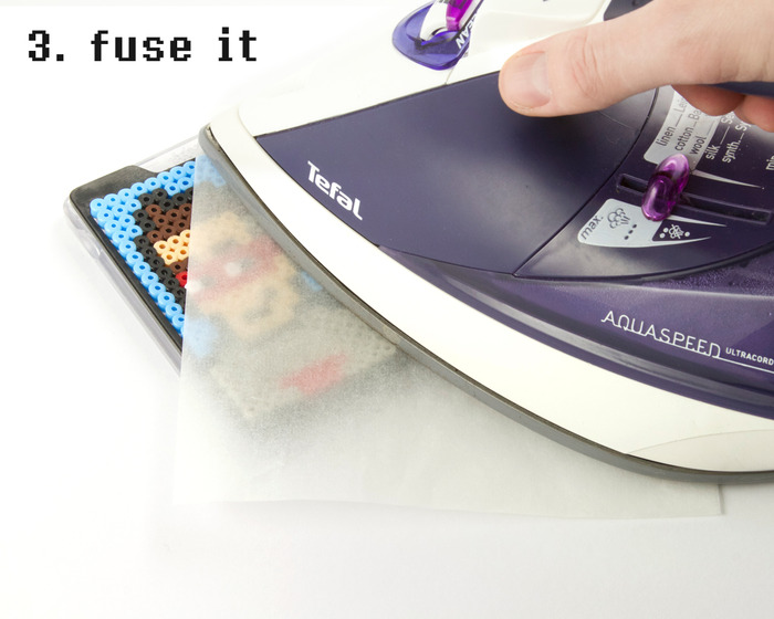 Borrow your Mum's iron and fuse the beads to the specially designed Fused Frame.
