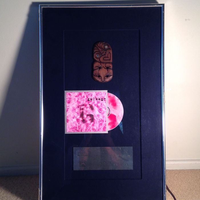 GARBAGE_Platinum Status Reward presented to BUTCH VIG