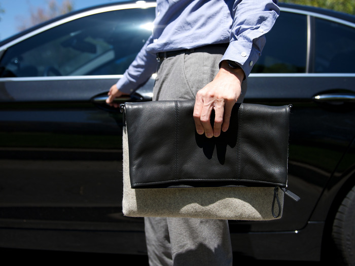 Leather side folded down used as a sleeve-style bag