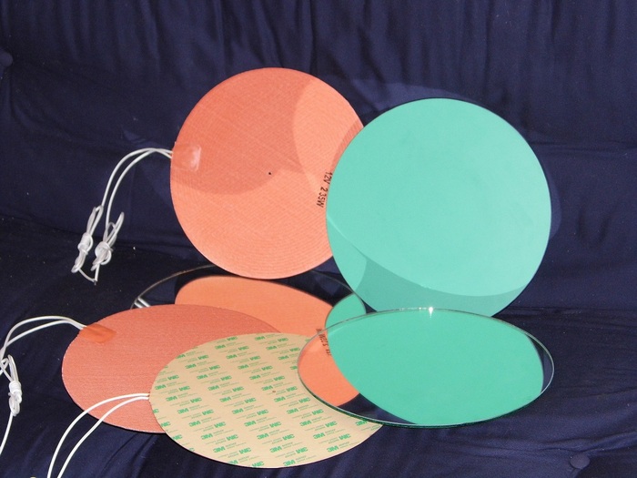 Custom made, high power (235W) silicon heater pads provide optimal heating for our round heated bed.