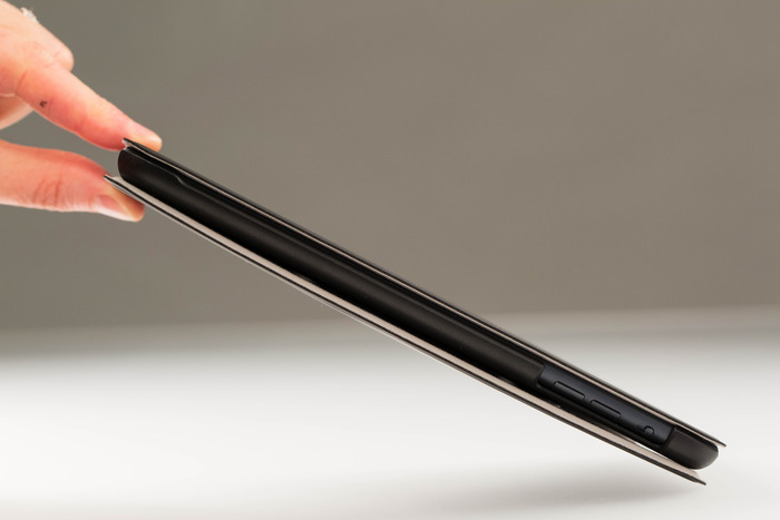 Less than 1 inch thick with iPad secure inside