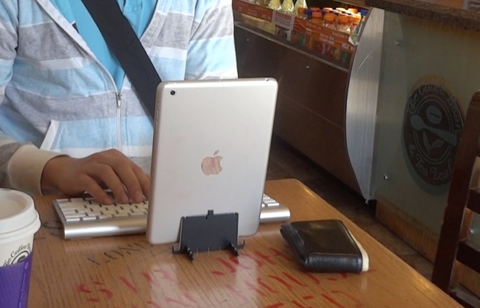 Holds small tablets in landscape or portrait and full-sized tablets in landscape