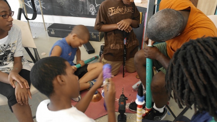 Participants from the free instrument building workshop at Project Row Houses