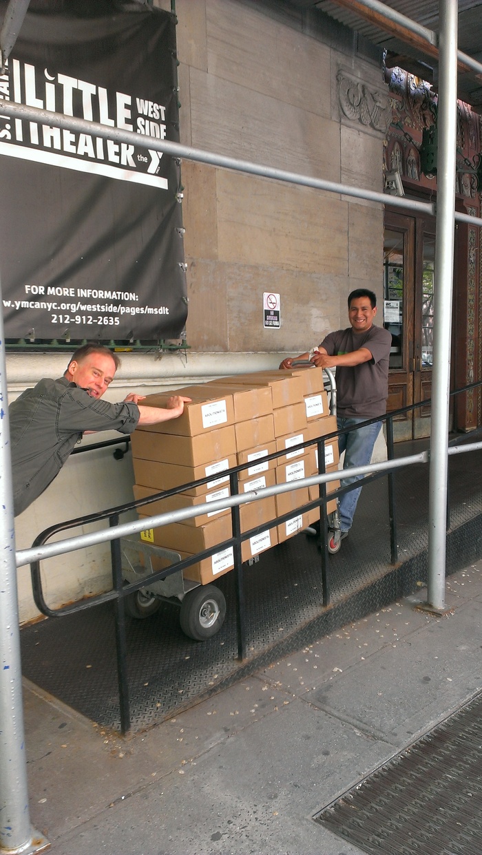 Pushing 550 lbs of comic books up a ramp.