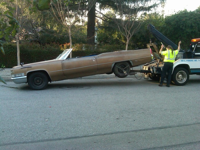Acquire a well-loved 1969 Cadillac in generally sound mechanical condition. Convince AAA that you should get free towing to retrieve it.