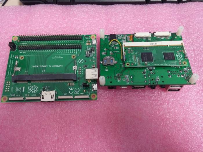 CoMo Booster(with the Compute Module plugged) and the official IO Board
