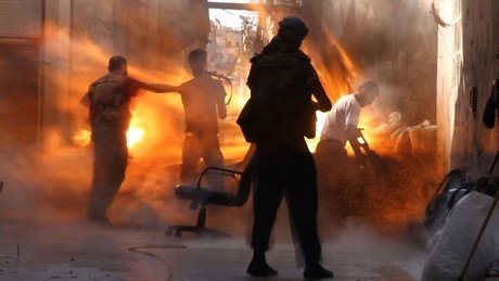 Tracey Shelton/GlobalPost. Tank fire hits a Syrian rebel post in Aleppo in late 2012, killing Issa Aiash, 30, his young brother Ahmed, 17, and Sheihk Mamoud, 42.