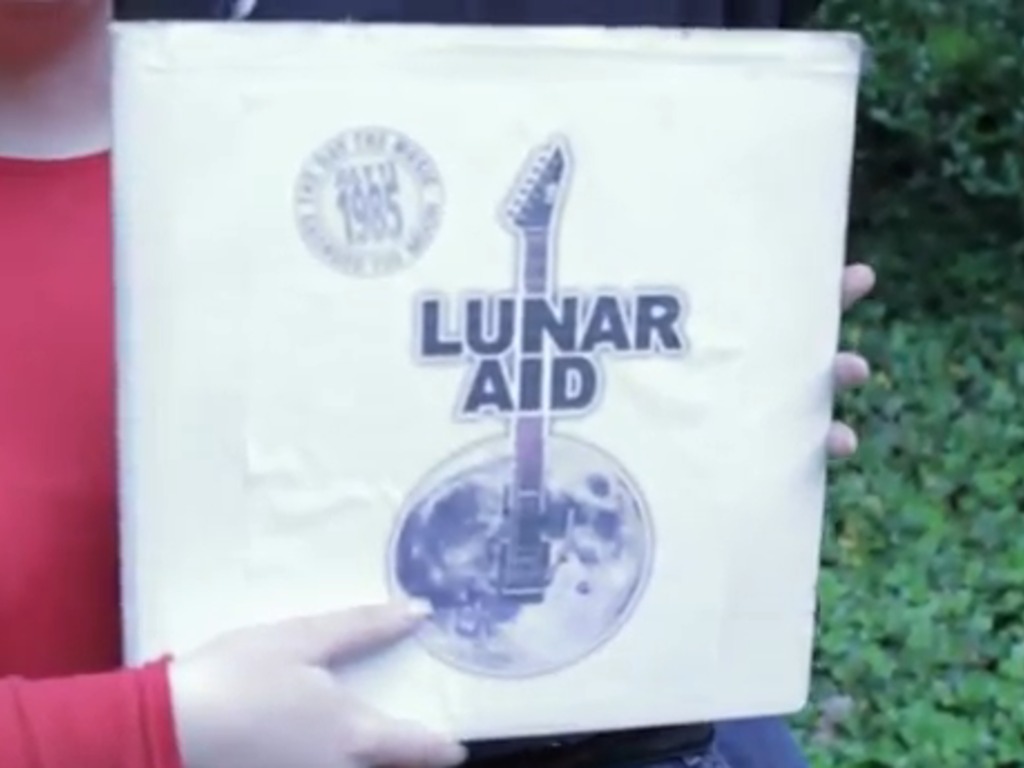 Space Folk Album: Lunar Aid 1985's video poster