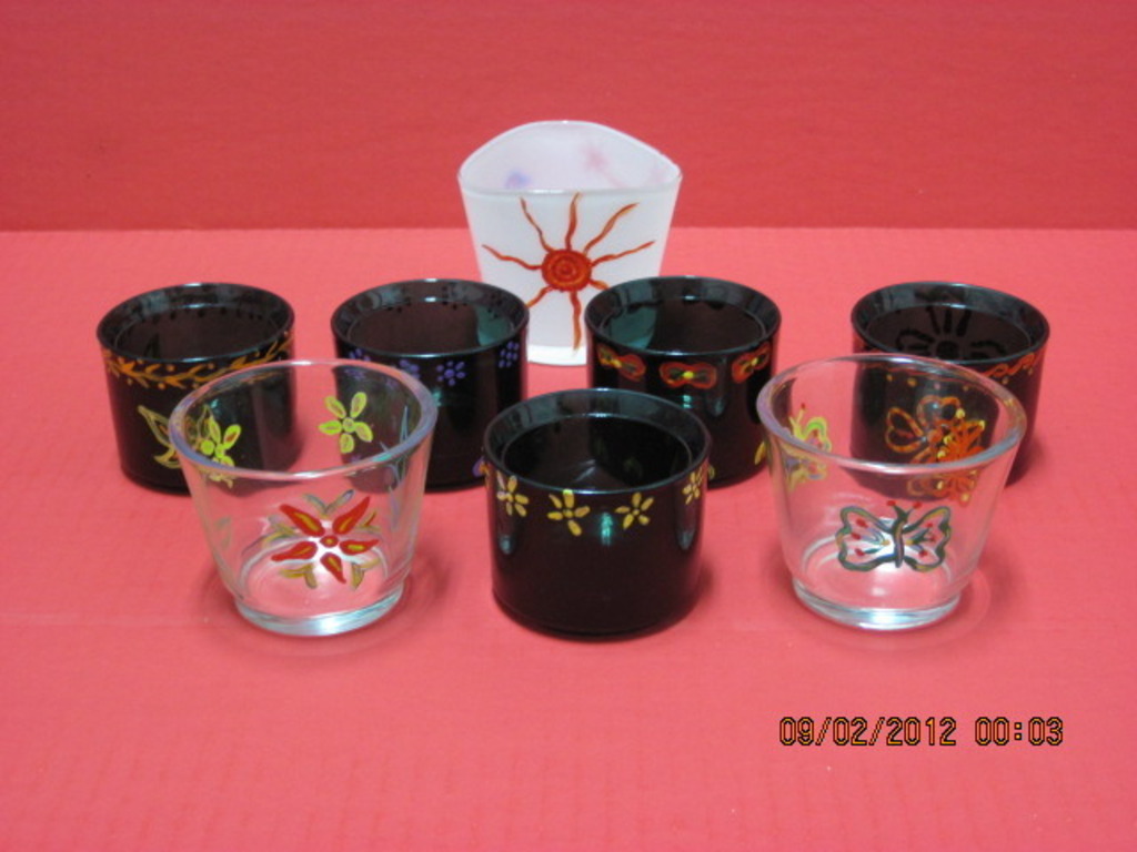 An elegent idea - hand crafted & painted tea light holders's video poster