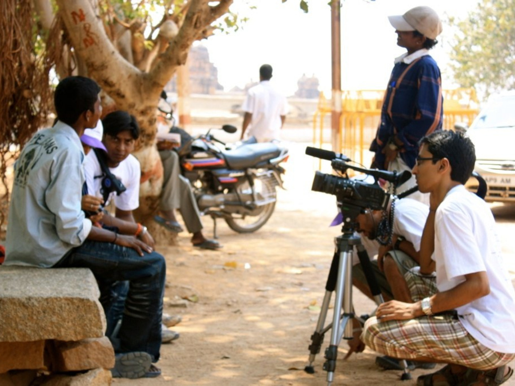 Globally Collaborative Filmmaking: Lives in Transit's video poster