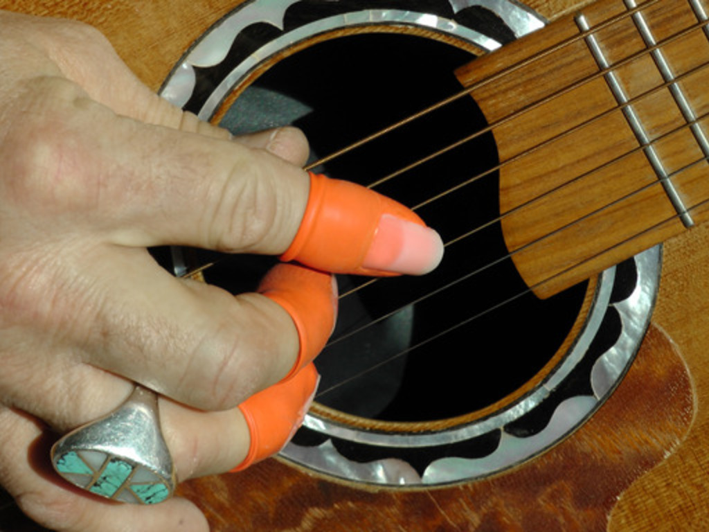 The Ultimate Fingerpick! Guitar, banjo, resonator, picks!'s video poster